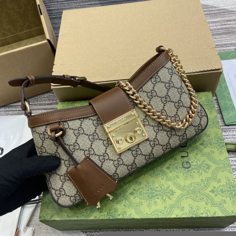 G*u*i top handle bags
